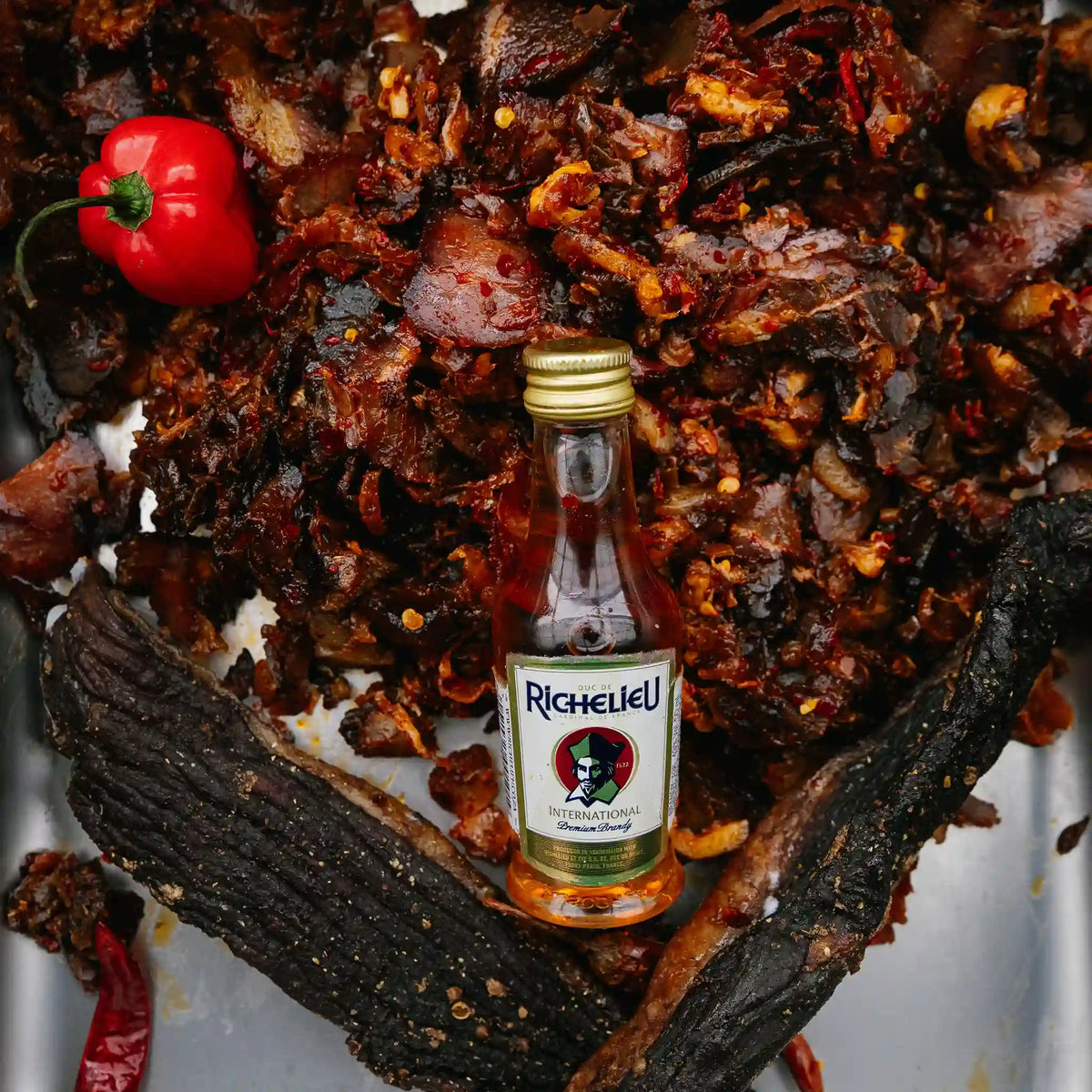 Babalas biltong from Greeff's Butchery, Knysna, with chillies and a small bottle of brandy.
