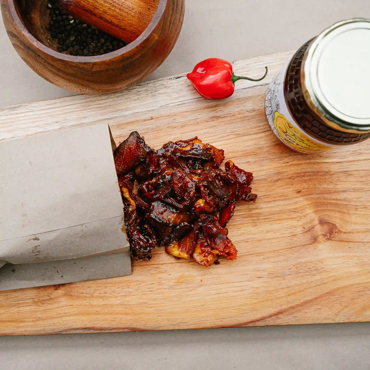Honey-glazed biltong from Greeff's Butchery, Knysna, on a wooden board
